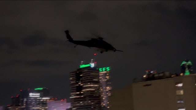 Why were military helicopters flying over Philadelphia on Thursday night?