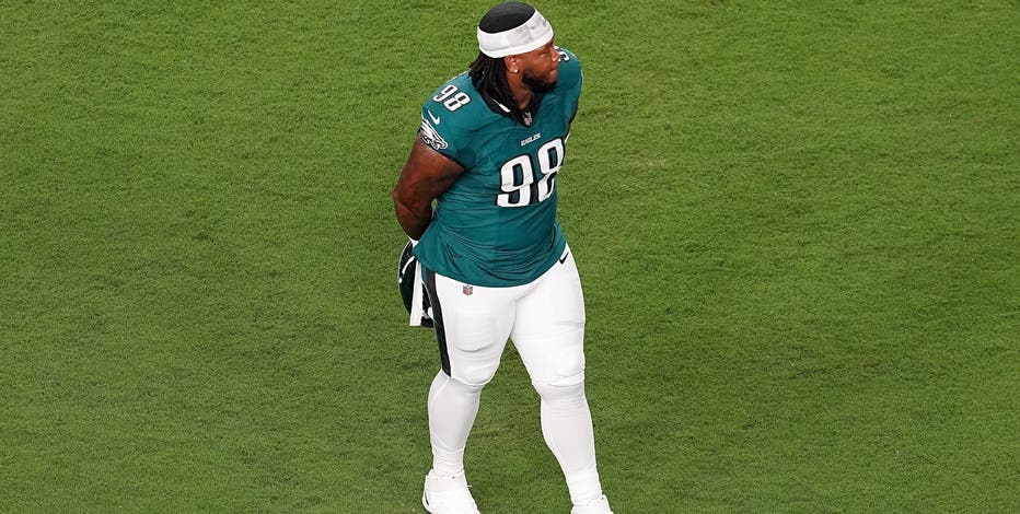 Eagles' Jalen Carter ejected after spitting on Cowboys' Dak Prescott