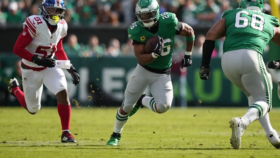 Saquon Barkley breaks out with 150 yards before hurting groin as Eagles pound Giants 38-20