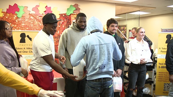 Eagles players hand out 250 Thanksgiving turkeys, sides at Camden FamGiving drive