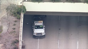 Car slams into stopped utility truck on I-676, 27-year-old Florida driver killed