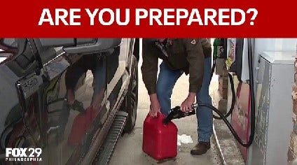 Shoppers crowd gas stations, grocery and liquor stores before winter snowstorm