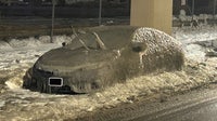 Parked car encased in ice during brutal stretch of below-freezing temps in Philadelphia