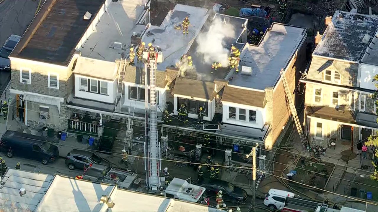 Elderly woman critical, firefighter hurt after rowhome fire in East Germantown