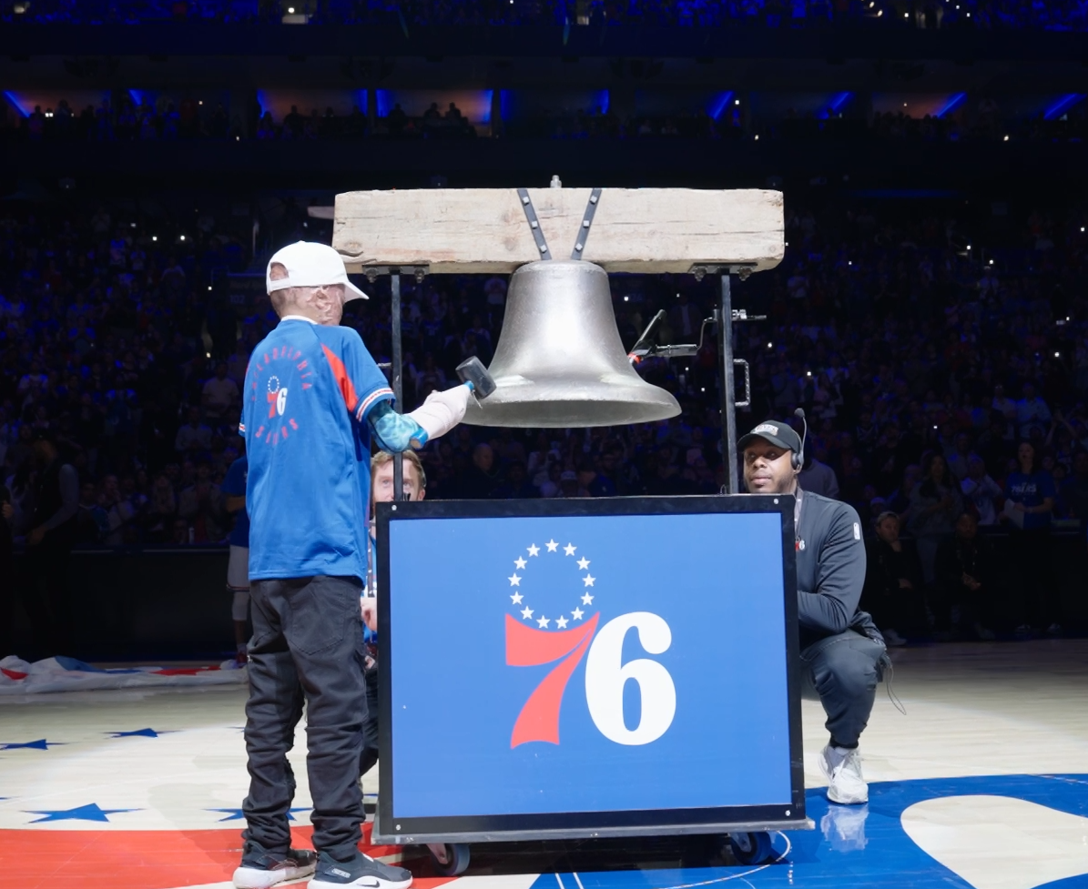10‑year‑old NE Philly medical jet crash survivor rings bell at Sixers game