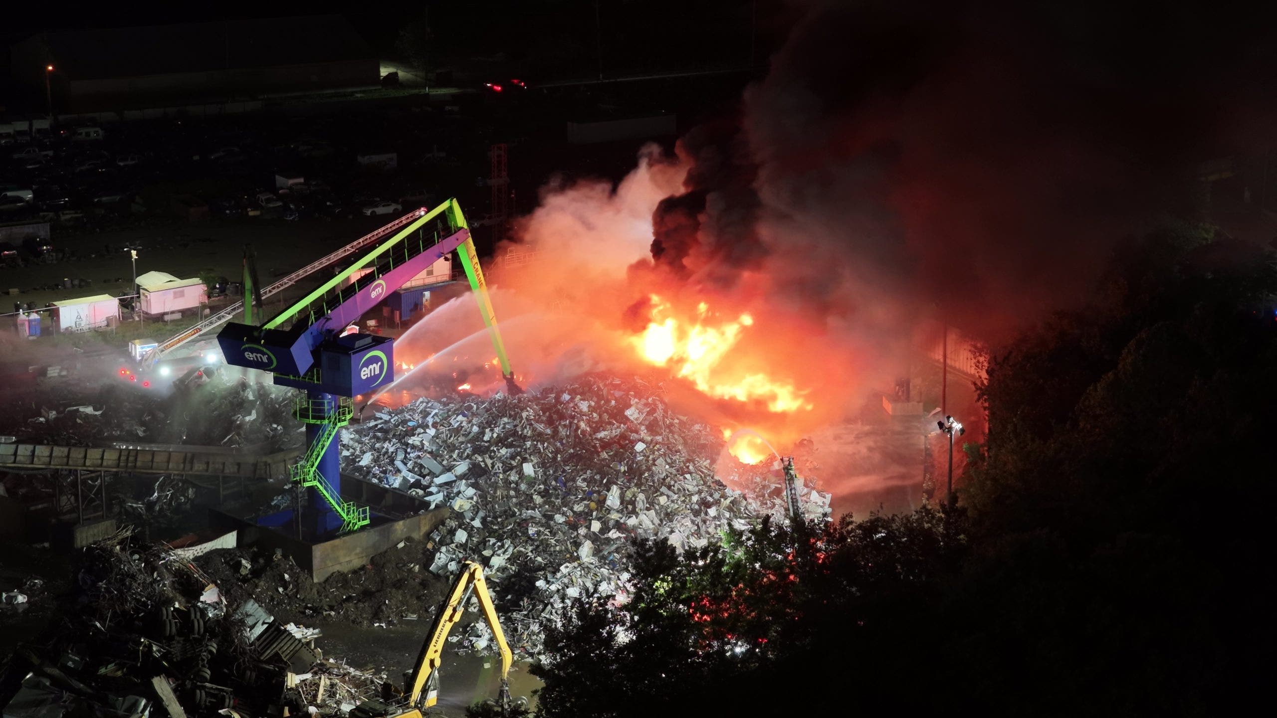 Firefighters battle junkyard fire in Camden, air quality concerns remain