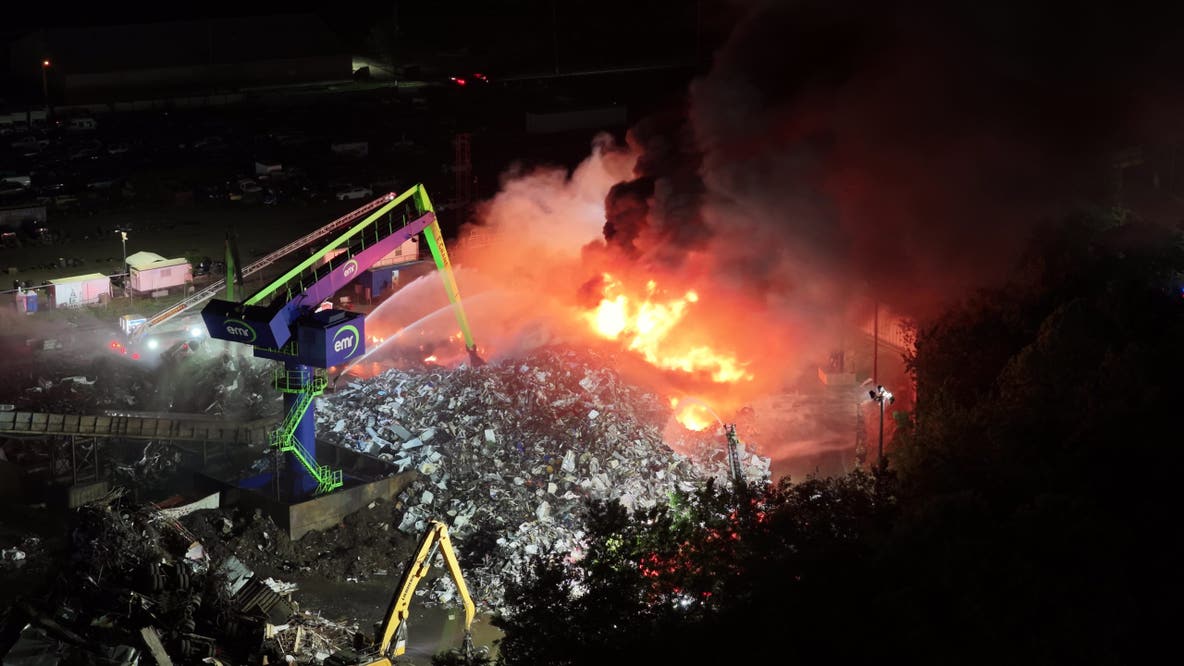 Firefighters battle junkyard fire in Camden, air quality concerns remain