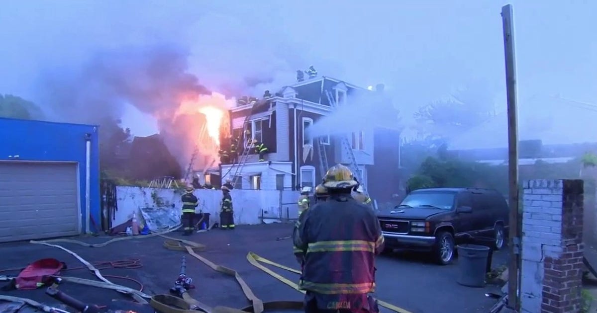Neighbors rescue woman trapped in Philadelphia house fire: 'She couldn't get out'