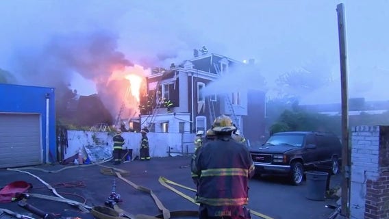 Neighbors rescue woman trapped in Philadelphia house fire: 'She couldn't get out'