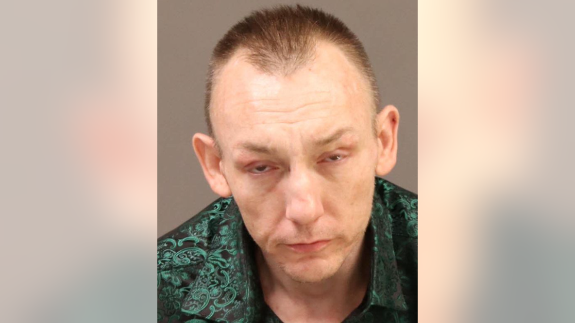 New details: Philadelphia man with prior convictions charged after guns, fake DEA badge found in car