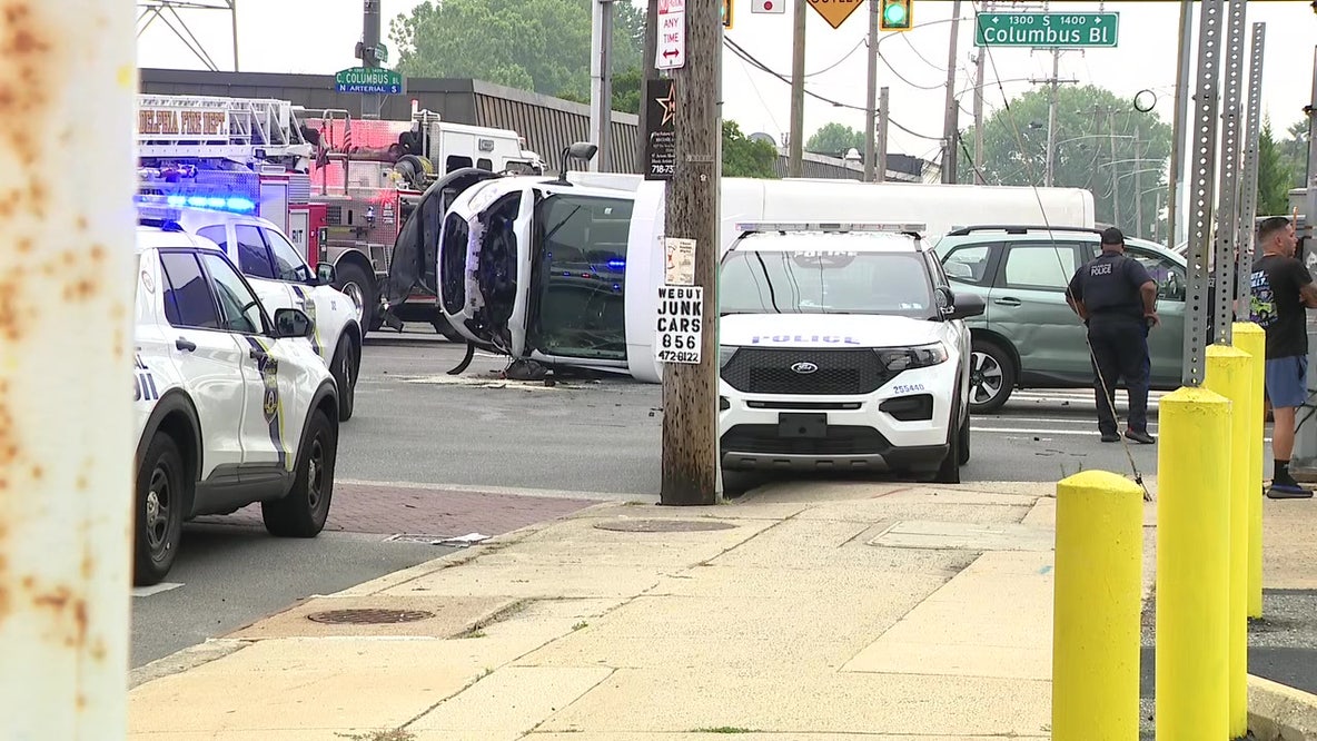 At least 1 person hospitalized after van overturns in South Philadelphia