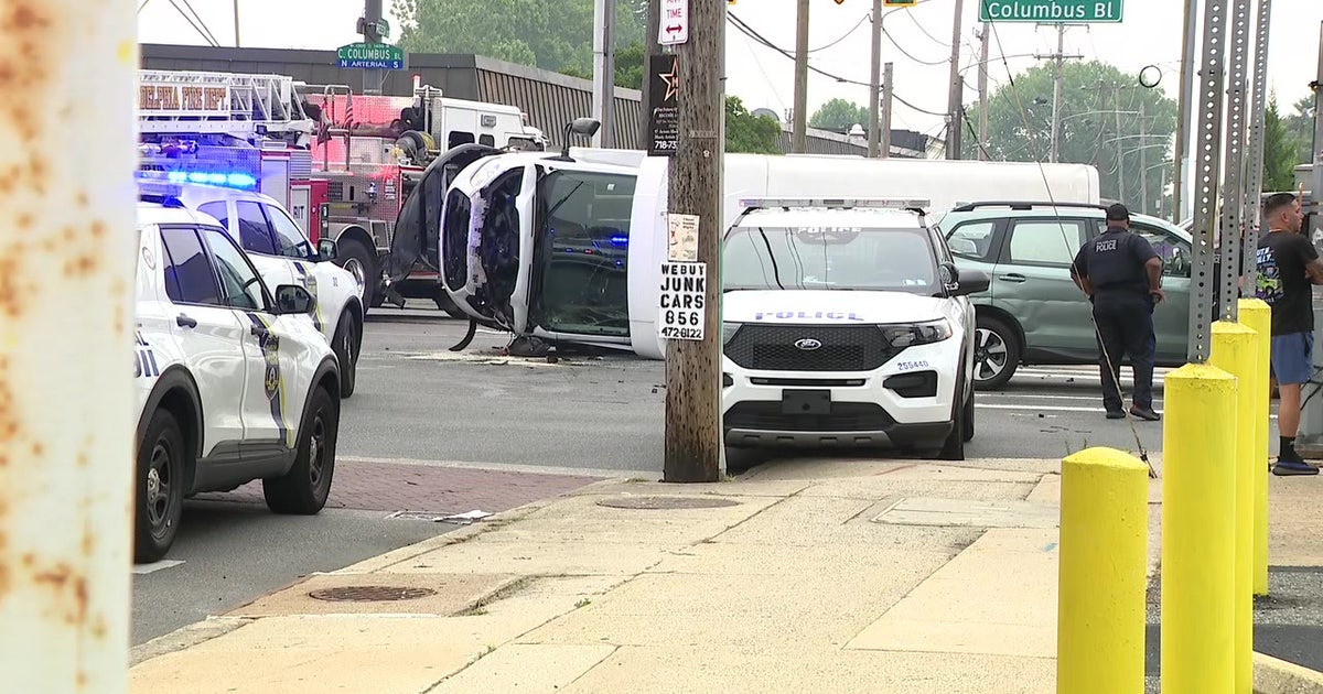 At least 1 person hospitalized after van overturns in South Philadelphia