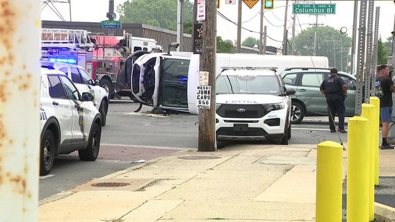 At least 1 person hospitalized after van overturns in South Philadelphia