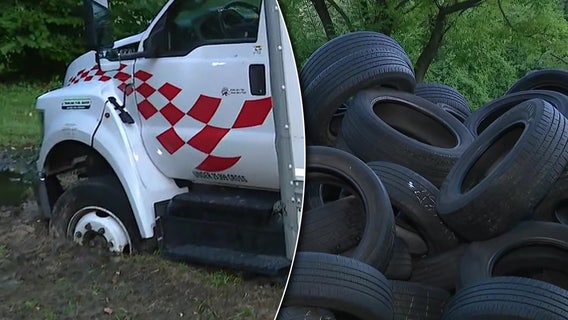 Truck stuck in mud after dumping hundreds of tires in Fairmount Park