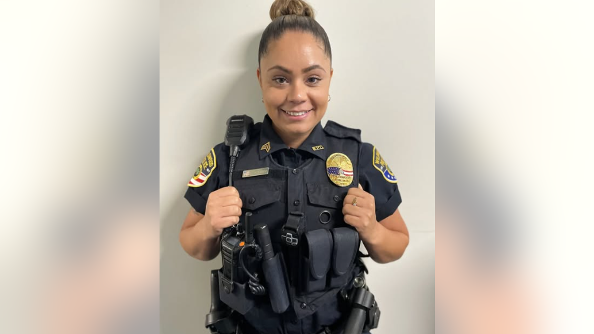 New Jersey police officer saves unconscious driver after car crashes into pond