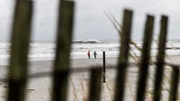 Nor'easter brings chilly rain and flooding to the shore before clearing Monday