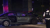 Woman killed, 2 others injured after car crashes into railway support beam near Girard Avenue
