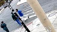 Suspect punches man crossing South Philadelphia street in the face, walks away laughing
