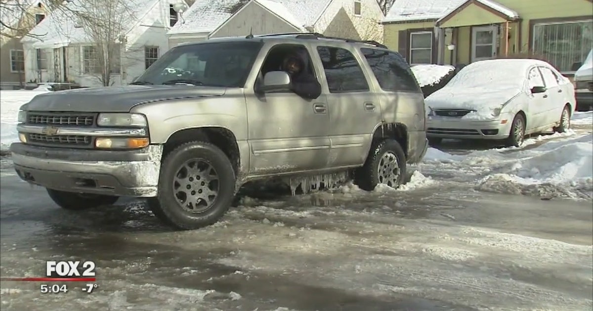 Detroit neighborhood frozen in after water main breaks, floods street ...