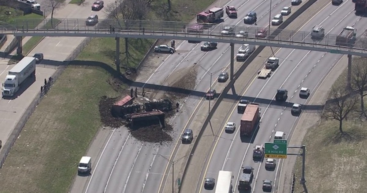 Northbound 75 reopened in Detroit after dump truck flips, loses load ...