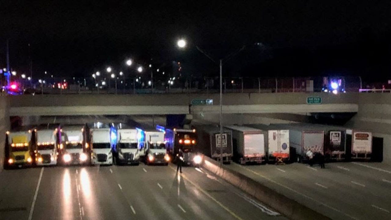 13 semis line Detroit freeway to help man considering suicide
