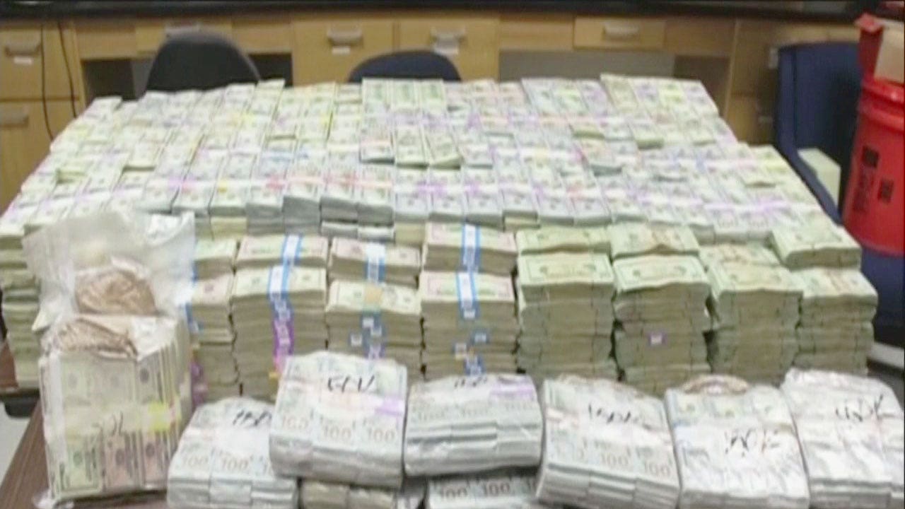 Miami police find $24 million cash hidden inside home in drug raid