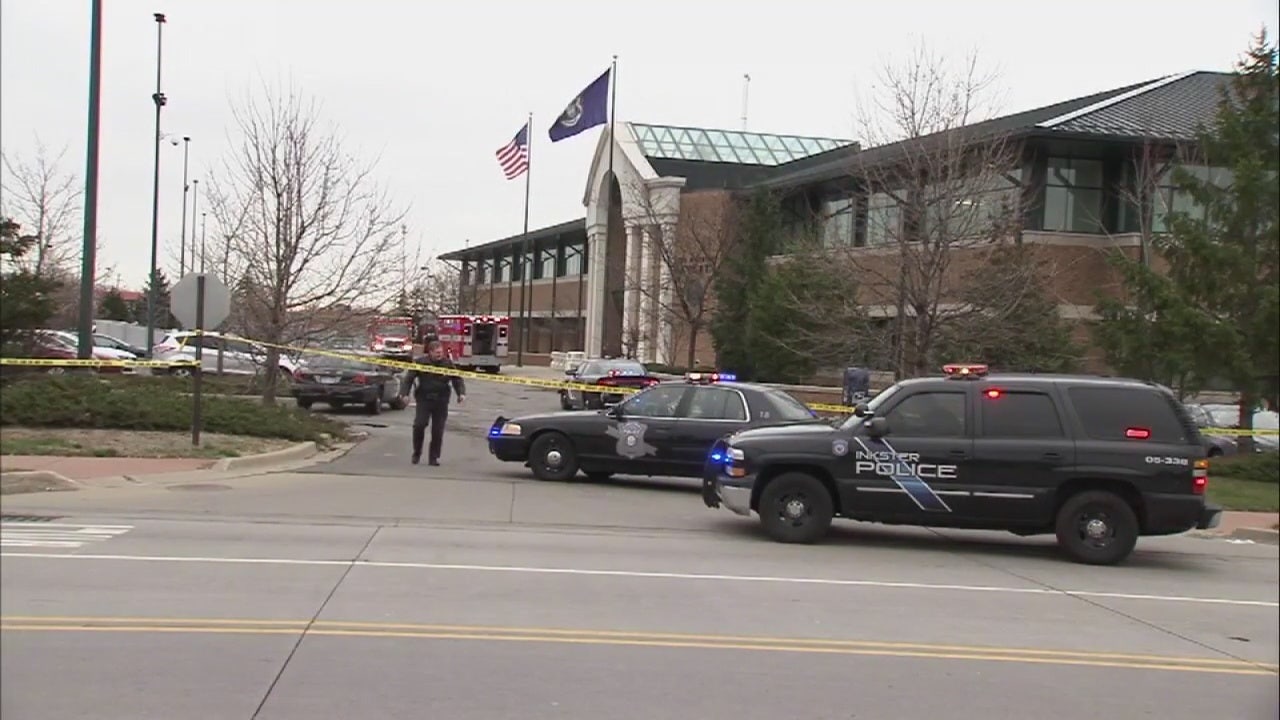 An armed man is shot and killed by a security guard inside the Dearborn ...