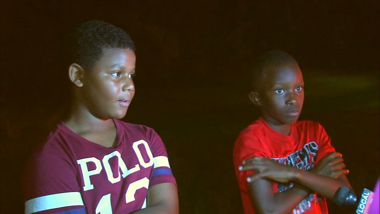 Boys knock on doors to help save families in Romulus apartment fire