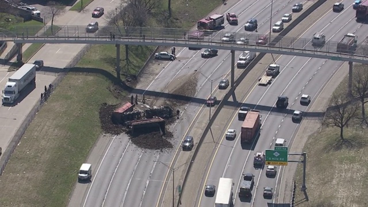 Northbound 75 Reopened In Detroit After Dump Truck Flips, Loses Load