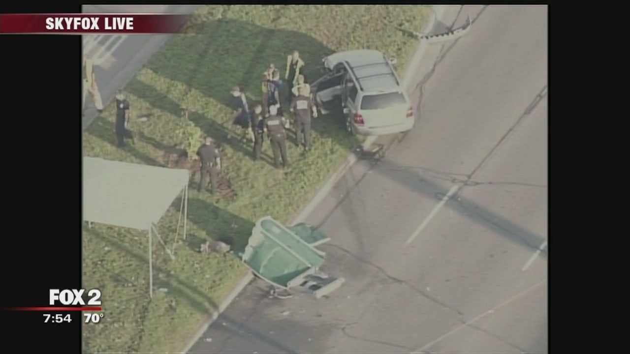 Car hits Porta Potty along Woodward, causes accident