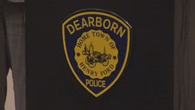 Dearborn police officer crashes after running stop sign