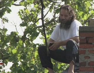 Artist_stakes_out_roof_to_protest_demo_o_1_20160802214150