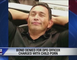 DPD officer charged with child porn alleged to have violent past