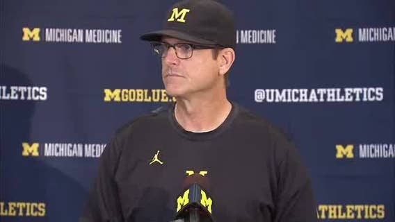 Michigan's big win quiets Harbaugh's critics _ for now