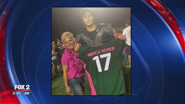 A football game where jerseys come off in the name of fighting cancer