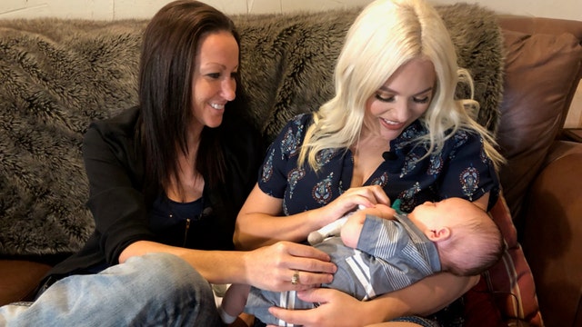 North Texas same-sex couple makes history by carrying same baby
