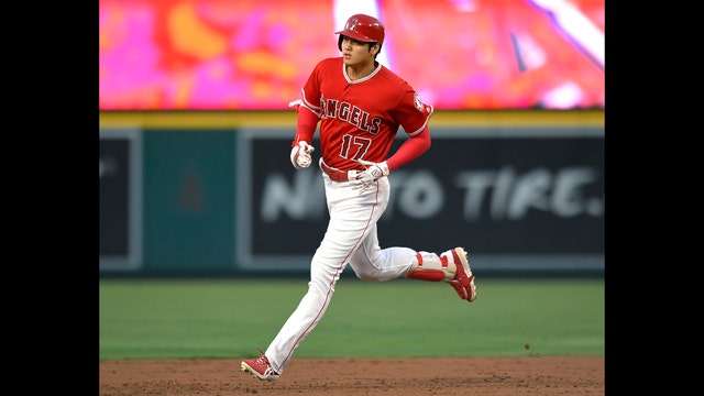 Ohtani, Upton hit Halos past Tigers 11-5 on Trout's birthday