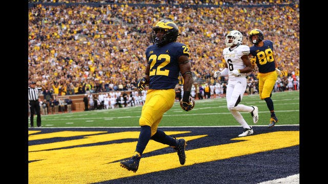 Michigan adjusts to decisions by 4 to skip Peach Bowl