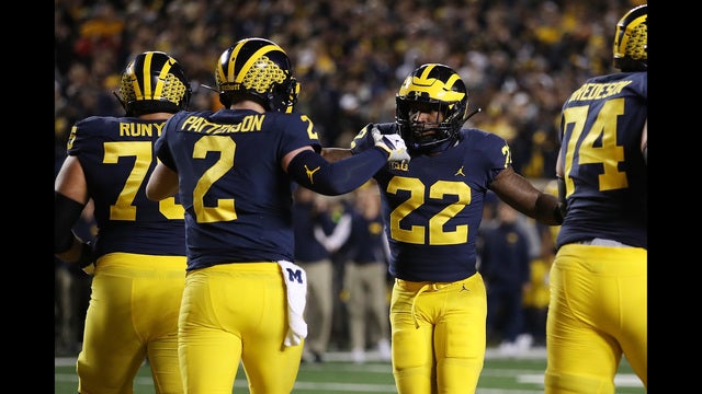 Patterson-led No. 12 Michigan routs No. 15 Wisconsin 38-13