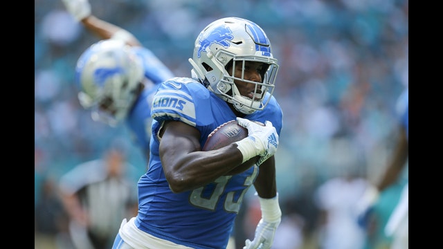 Johnson's 158 yards rushing help Lions beat Dolphins 32-21