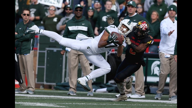 Michigan State stuffs Maryland, 24-3