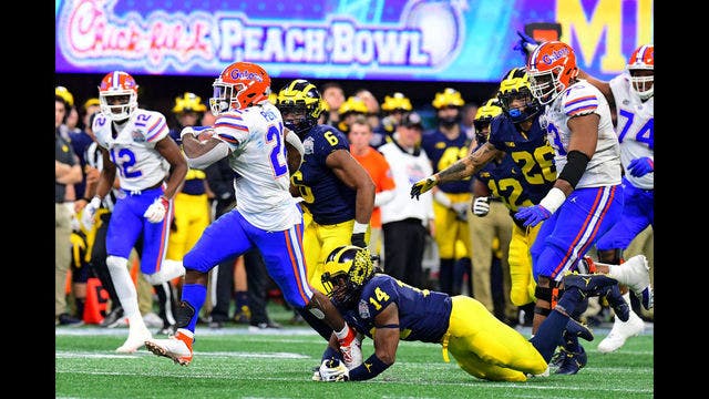 Peach Bowl: Gators rout Michigan 41-15 to cap comeback year