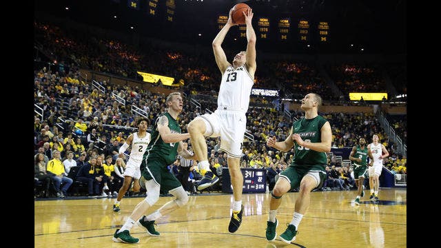 No. 2 Michigan pulls away for 74-52 win over Binghamton