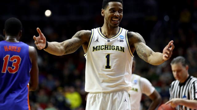 WATCH: Hammond with Poole, Beilein, Simpson, Livers & Teske after their 64-49 win over Florida