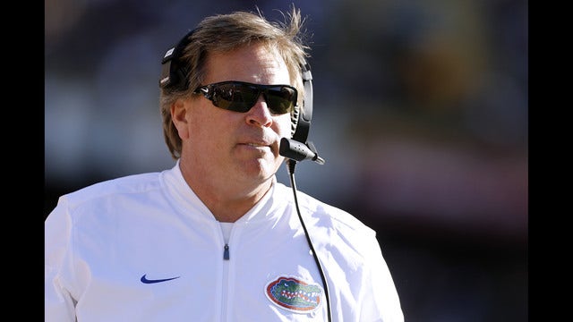 Michigan adds former Florida coach Jim McElwain as assistant