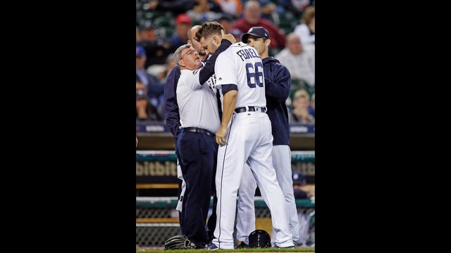 Tigers pitcher Ferrell hit in head by liner, jogs off mound