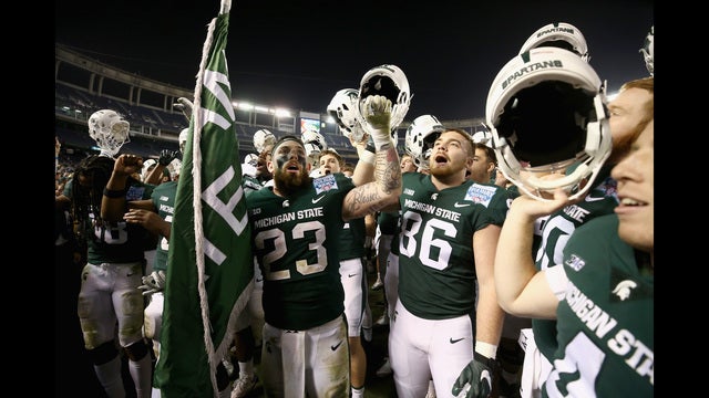 Lewerke, Spartans roll past Cougars 42-17 in Holiday Bowl