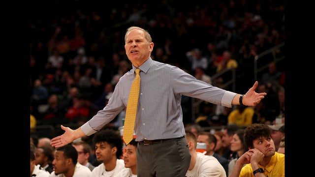 No. 15 Michigan overcomes Iowa in OT 77-71 in Big Ten