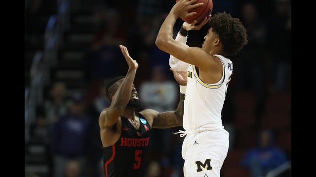 Poole's shot for Michigan draws comparisons to Burke's