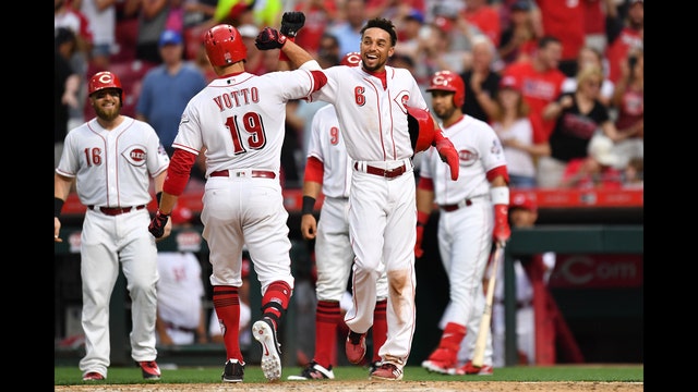 Votto breaks drought with grand slam as Reds beat Tigers 9-5